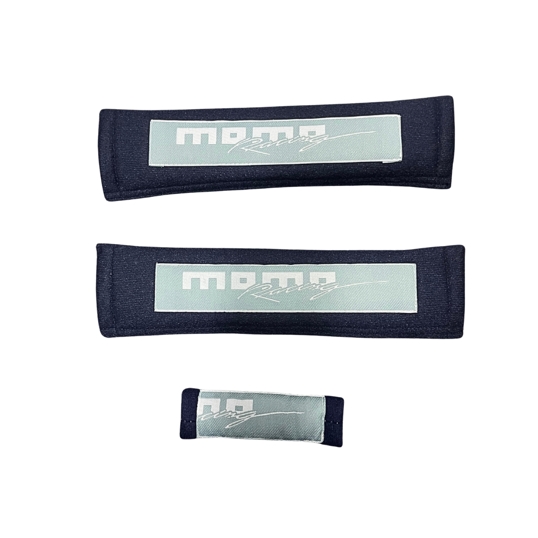 protector cinturón momo, funda cinturón auto, accesorio cinturón seguridad, protector acolchado cinturón, momo racing cinturón, comodidad auto momo, cinturón deportivo auto