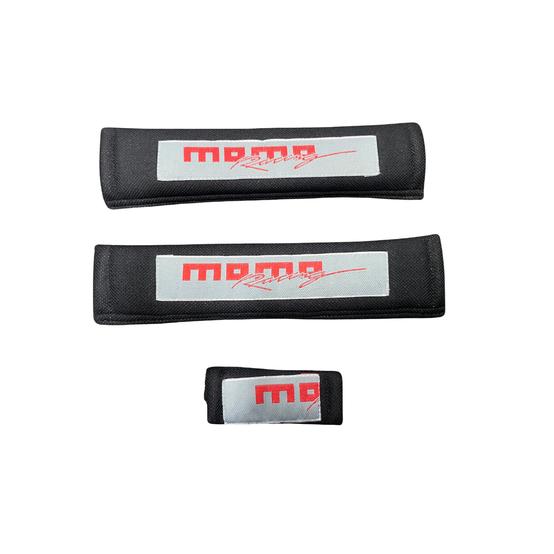 protector cinturón momo, funda cinturón auto, accesorio cinturón seguridad, protector acolchado cinturón, momo racing cinturón, comodidad auto momo, cinturón deportivo auto