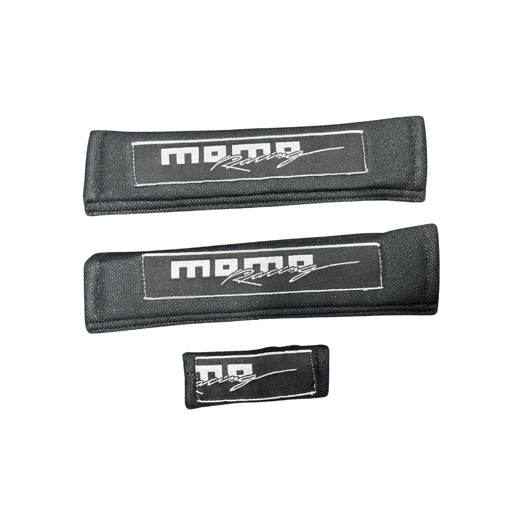 protector cinturón momo, funda cinturón auto, accesorio cinturón seguridad, protector acolchado cinturón, momo racing cinturón, comodidad auto momo, cinturón deportivo auto